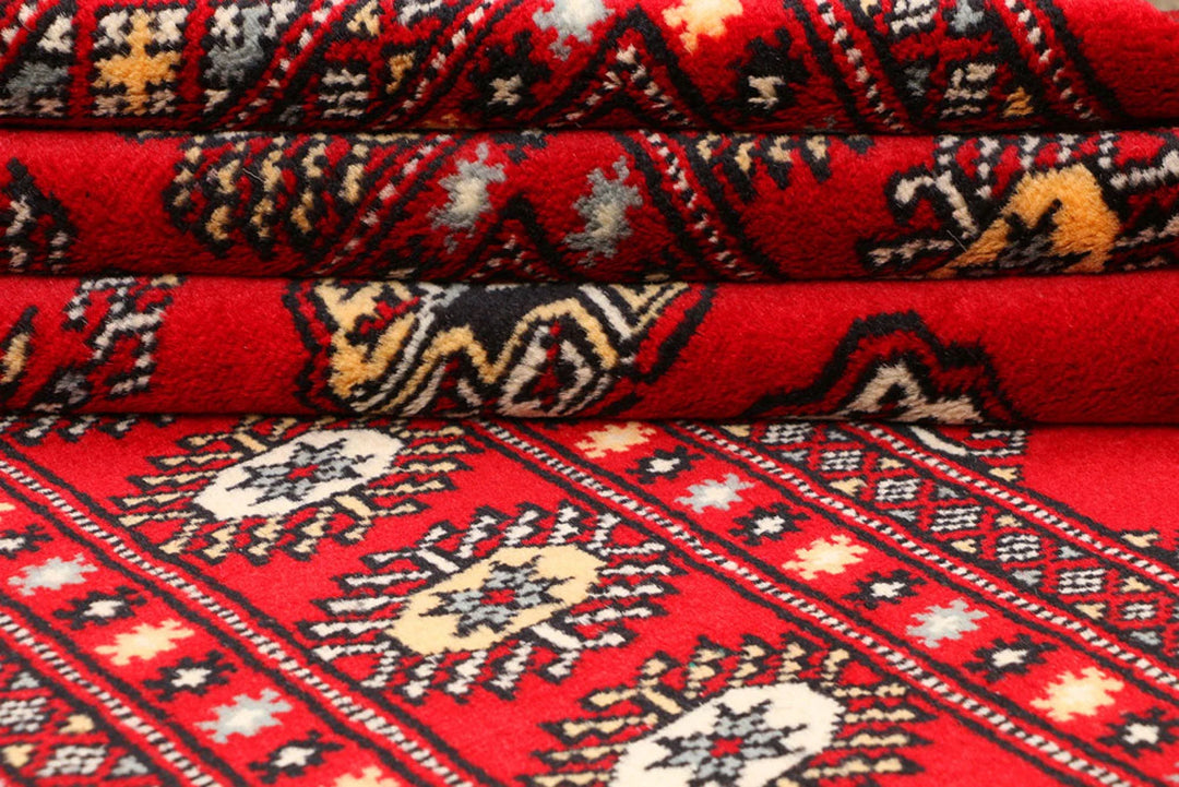 Red Pakistani Bokhara Rug 3' 1" x 5' 7" Hand-Knotted | No. QA23324