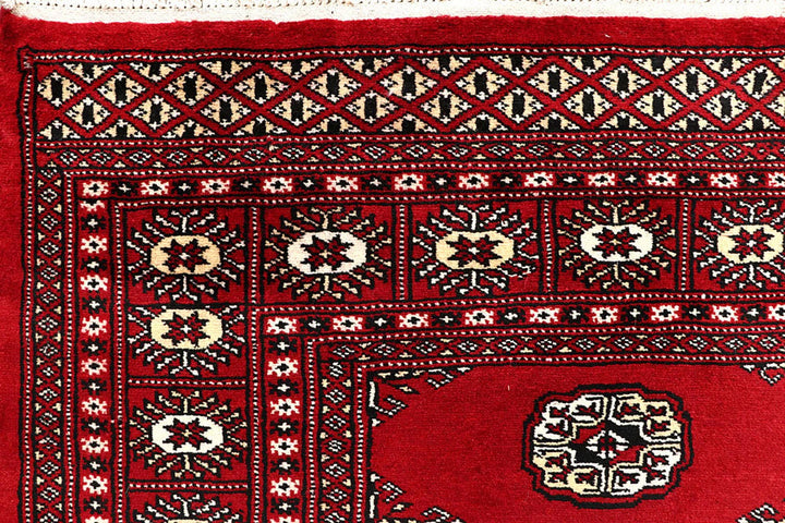 Red Pakistani Bokhara Rug 6' x 8'9" Hand-Knotted | No. QA23572