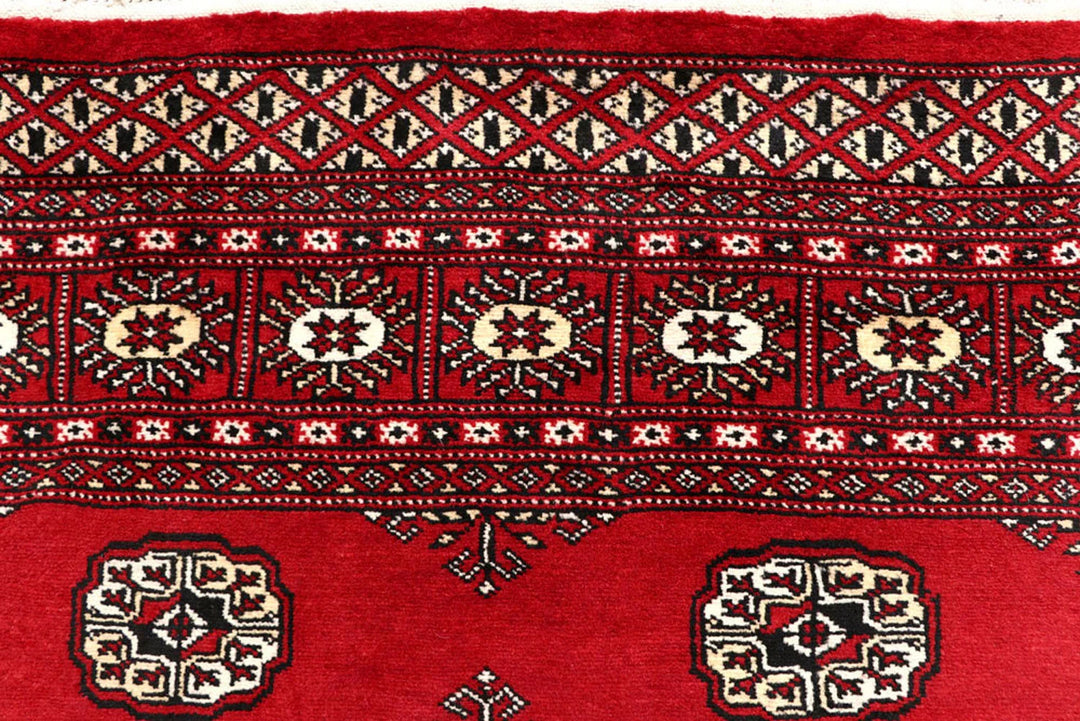 Red Pakistani Bokhara Rug 6' x 8'9" Hand-Knotted | No. QA23572