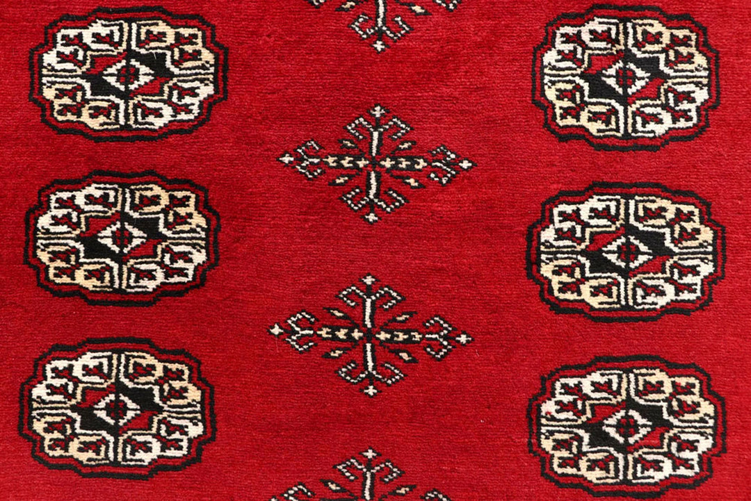 Red Pakistani Bokhara Rug 6' x 8'9" Hand-Knotted | No. QA23572