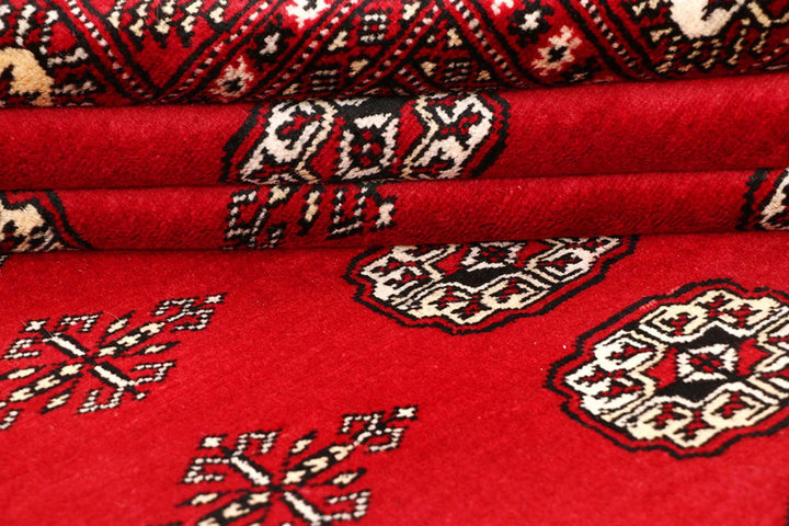 Red Pakistani Bokhara Rug 6' x 8'9" Hand-Knotted | No. QA23572