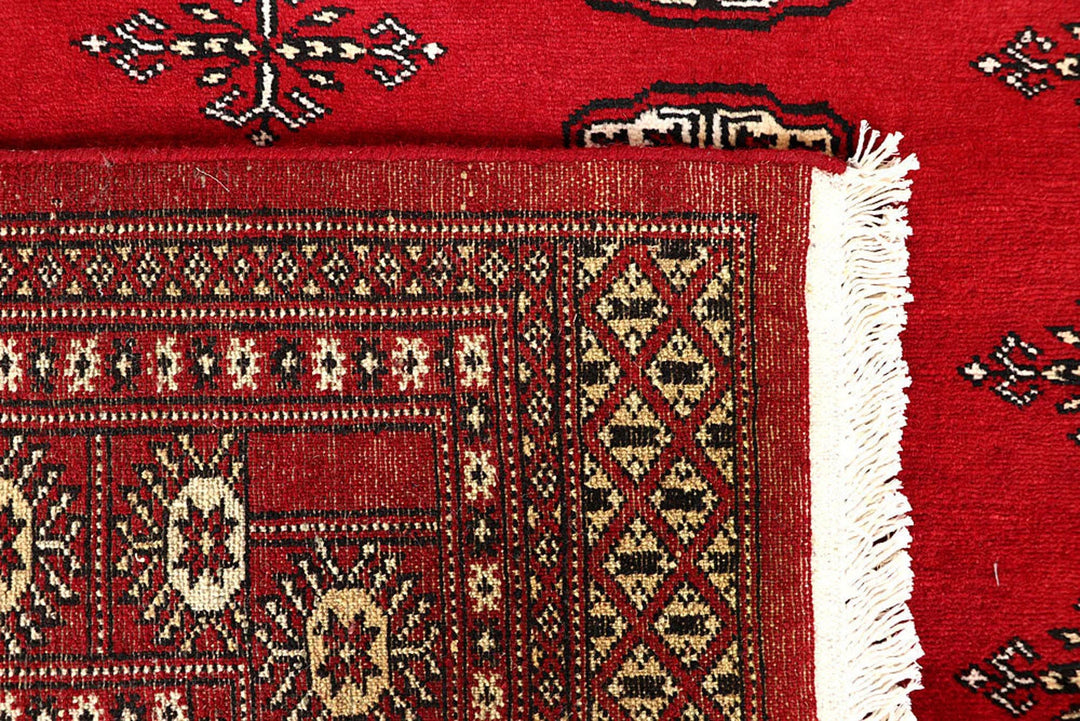 Red Pakistani Bokhara Rug 6' x 8'9" Hand-Knotted | No. QA23572