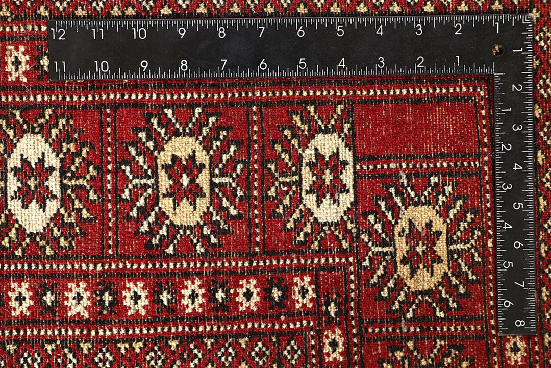 Red Pakistani Bokhara Rug 6' x 8'9" Hand-Knotted | No. QA23572