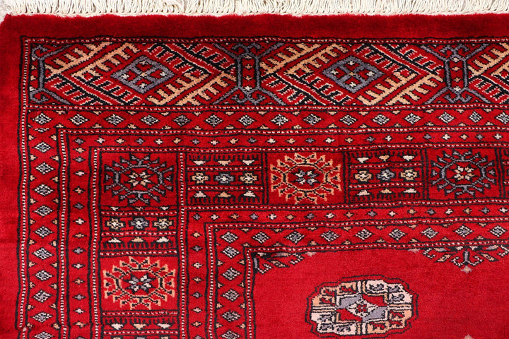 Red Pakistani Bokhara Rug 4' 1" x 6' 5" Hand-Knotted | No. QA23603