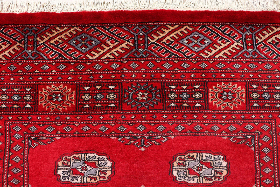 Red Pakistani Bokhara Rug 4' 1" x 6' 5" Hand-Knotted | No. QA23603