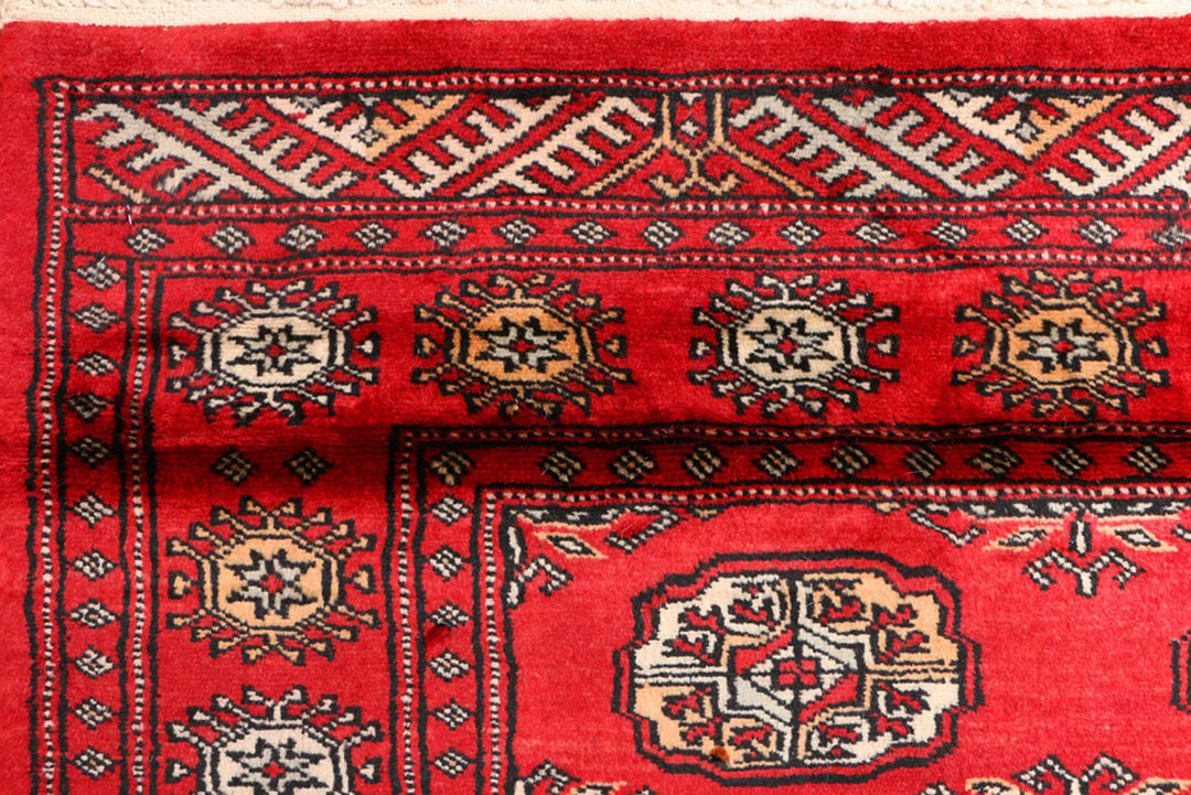 Red Pakistani Bokhara Rug 3' 2" x 6' Hand-Knotted | No. QA24223