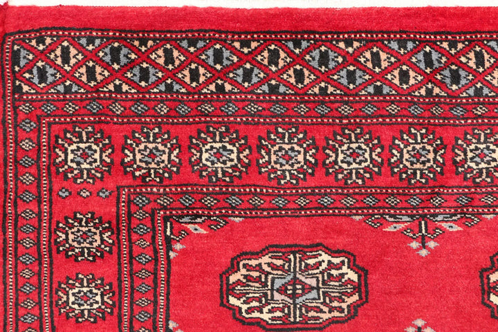 Dark Red Pakistani Bokhara Rug 3' 1" x 5' 10" Hand-Knotted | No. QA24786