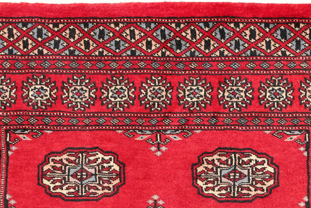 Dark Red Pakistani Bokhara Rug 3' 1" x 5' 10" Hand-Knotted | No. QA24786