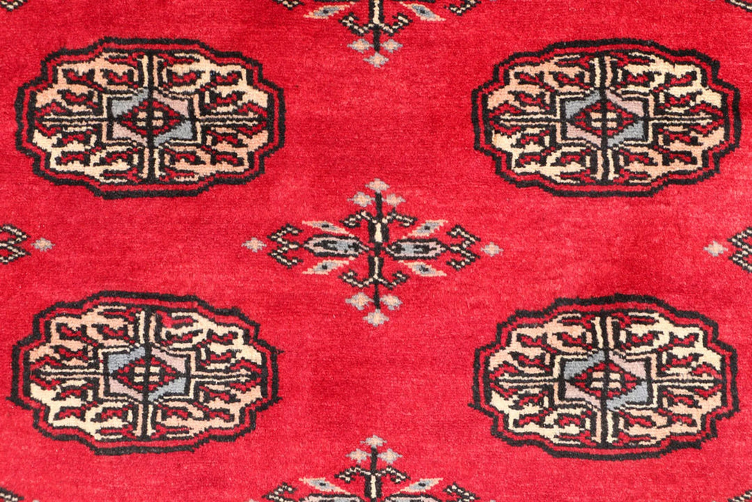 Dark Red Pakistani Bokhara Rug 3' 1" x 5' 10" Hand-Knotted | No. QA24786