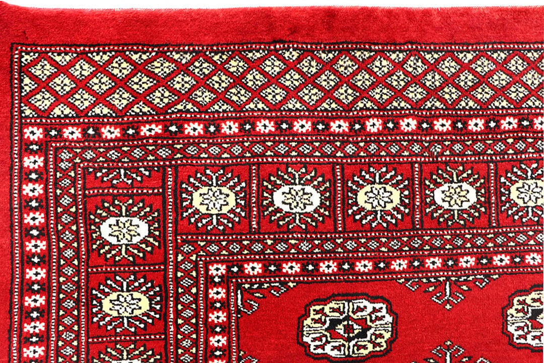 Red Pakistani Bokhara Rug 6' x 9' Hand-Knotted | No. QA24811