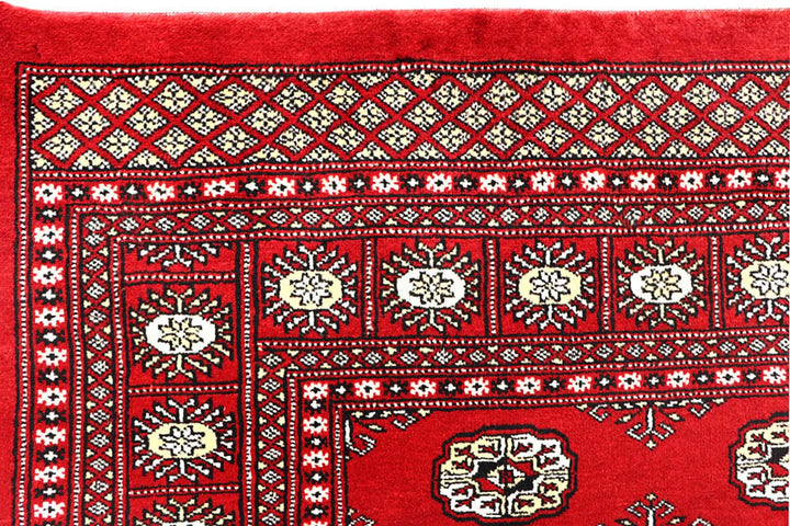 Red Pakistani Bokhara Rug 6' x 9' Hand-Knotted | No. QA24811