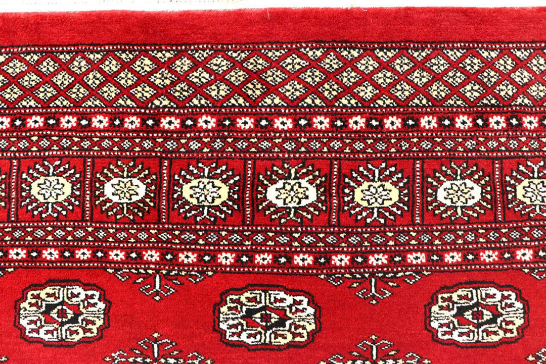 Red Pakistani Bokhara Rug 6' x 9' Hand-Knotted | No. QA24811
