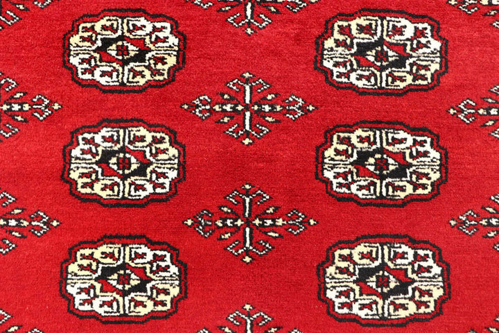Red Pakistani Bokhara Rug 6' x 9' Hand-Knotted | No. QA24811