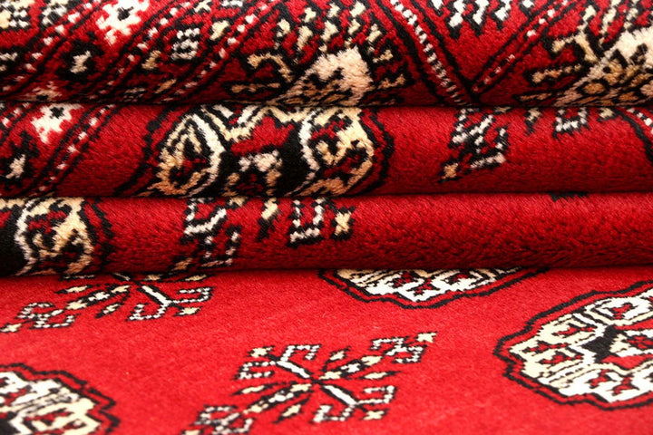 Red Pakistani Bokhara Rug 6' x 9' Hand-Knotted | No. QA24811