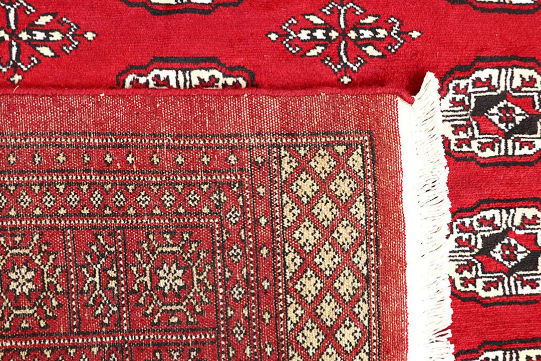 Red Pakistani Bokhara Rug 5' 7" x 8' Hand-Knotted | No. QA25052