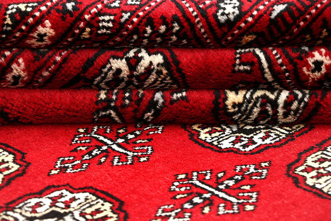 Red Pakistani Bokhara Rug 5' 11" x 8' 8" Hand-Knotted | No. QA25056