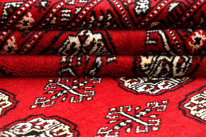 Red Pakistani Bokhara Rug 5' 11" x 8' 8" Hand-Knotted | No. QA25056