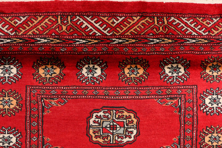 Red Pakistani Bokhara Rug 3' 2" x 6' 2" Hand-Knotted | No. QA26148
