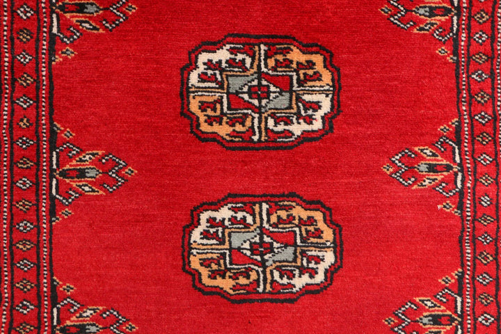 Red Pakistani Bokhara Rug 3' 2" x 6' 2" Hand-Knotted | No. QA26148