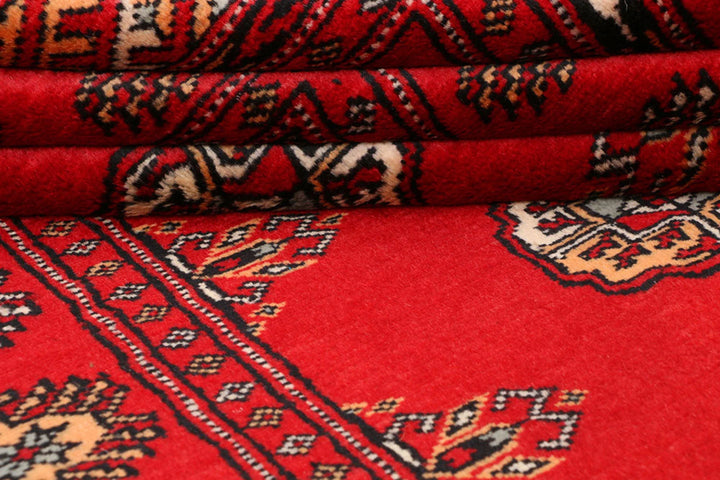Red Pakistani Bokhara Rug 3' 2" x 6' 2" Hand-Knotted | No. QA26148