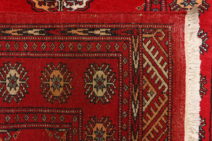 Red Pakistani Bokhara Rug 3' 2" x 6' 2" Hand-Knotted | No. QA26148