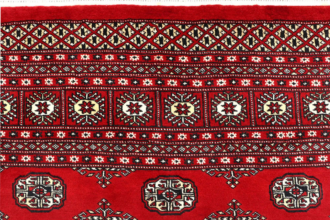 Red Pakistani Bokhara Rug 8' 1" x 10' 1" Hand-Knotted | No. QA26168