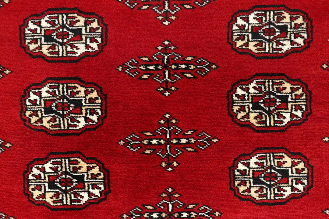 Red Pakistani Bokhara Rug 8' 1" x 10' 1" Hand-Knotted | No. QA26168