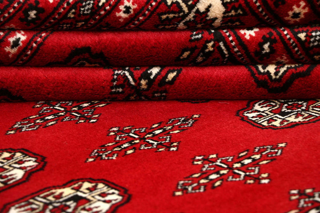 Red Pakistani Bokhara Rug 8' 1" x 10' 1" Hand-Knotted | No. QA26168