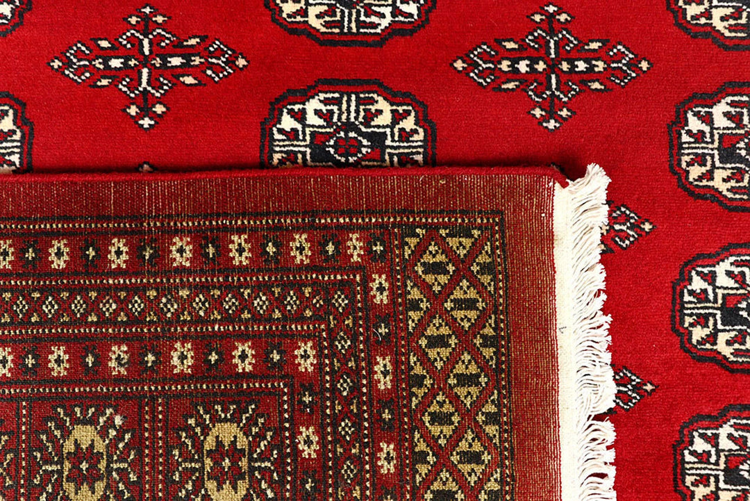Red Pakistani Bokhara Rug 8' 1" x 10' 1" Hand-Knotted | No. QA26168