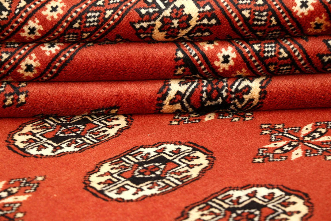 Orange Red Pakistani Bokhara Rug 5' 1" x 8' 1" Hand-Knotted | No. QA26472