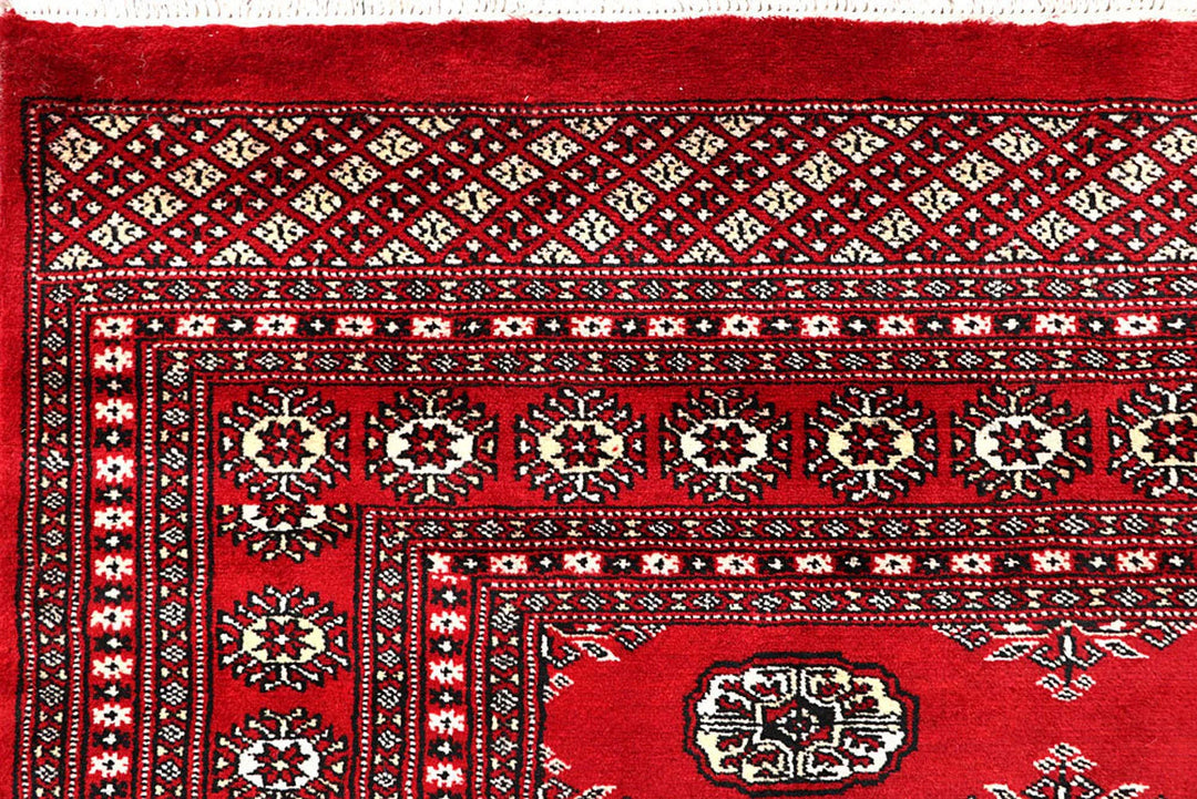 Red Pakistani Bokhara Rug 5' 11" x 8' 10" Hand-Knotted | No. QA26790