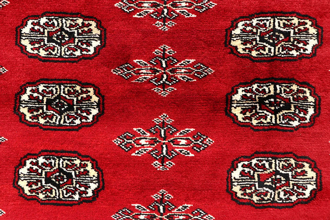 Red Pakistani Bokhara Rug 5' 11" x 8' 10" Hand-Knotted | No. QA26790