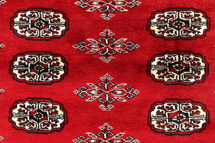 Red Pakistani Bokhara Rug 5' 11" x 8' 10" Hand-Knotted | No. QA26790