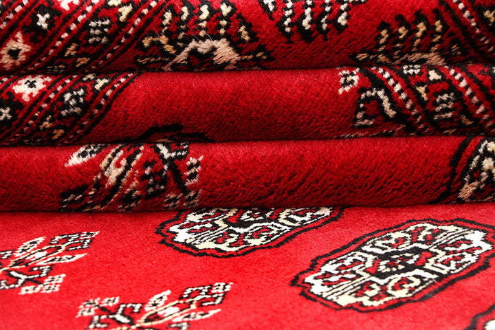 Red Pakistani Bokhara Rug 5' 11" x 8' 10" Hand-Knotted | No. QA26790