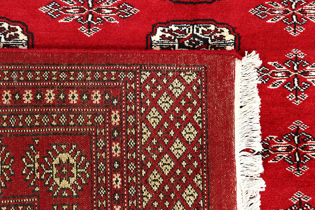 Red Pakistani Bokhara Rug 5' 11" x 8' 10" Hand-Knotted | No. QA26790