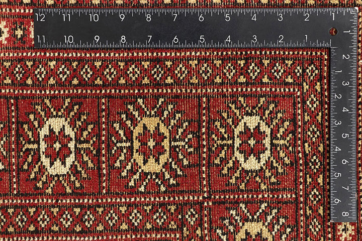Crimson Pakistani Bokhara Rug 6' 1" x 9' 1" Hand-Knotted | No. QA26803