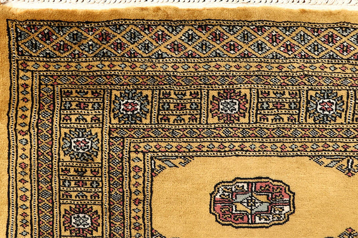 Gold Bokhara Rug 4' 2" x 6' 2" Hand-Knotted | No. QA26914