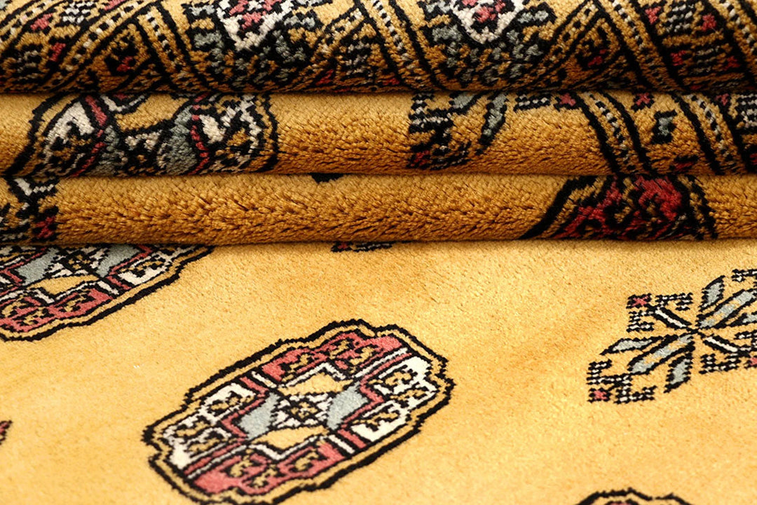 Gold Bokhara Rug 4' 2" x 6' 2" Hand-Knotted | No. QA26914