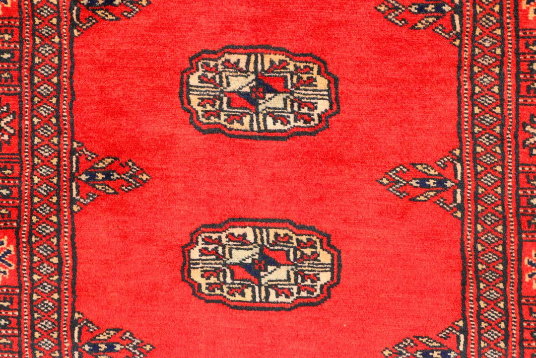Red Pakistani Bokhara Rug 2' 7" x 11' 2" Hand-Knotted | No. QA27241