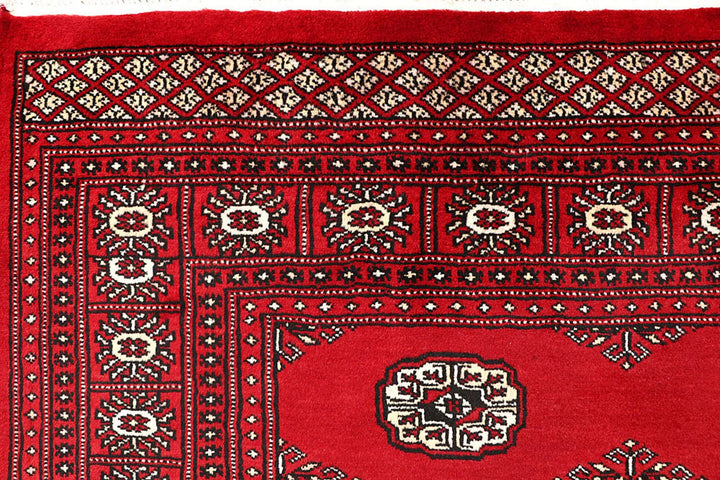 Firebrick Red Pakistani Bokhara Rug 5' 7" x 8' 10" Hand-Knotted | No. QA27255