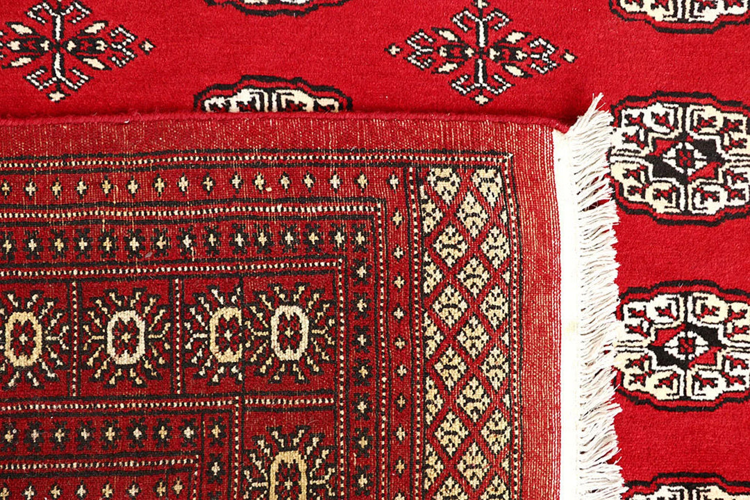 Firebrick Red Pakistani Bokhara Rug 5' 7" x 8' 10" Hand-Knotted | No. QA27255