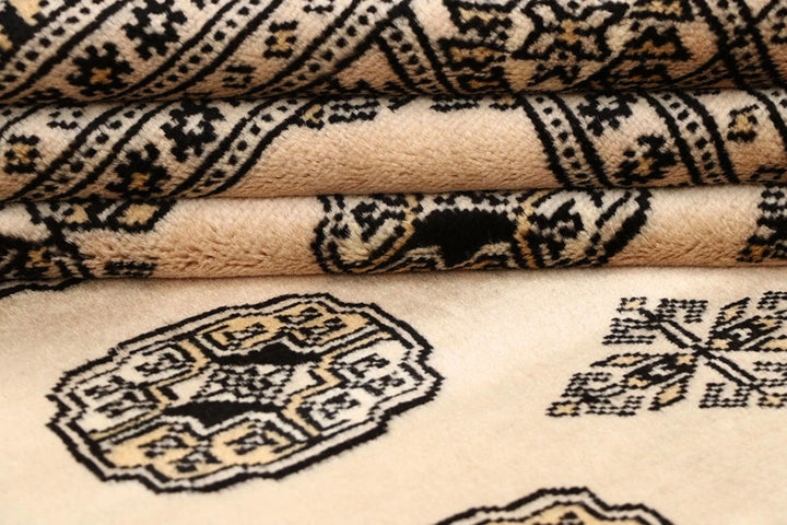 Brown Pakistani Bokhara Rug 4' 2" x 6' 7" Hand-Knotted | No. QA27421