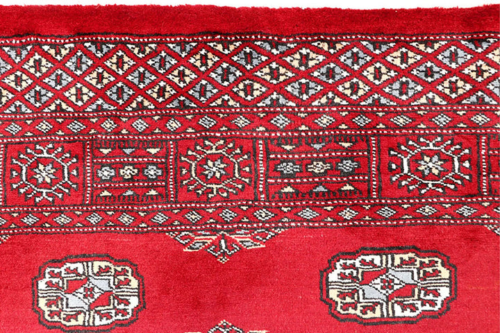 Red Pakistani Bokhara Rug 4' x 6'2" Hand-Knotted | No. QA27568