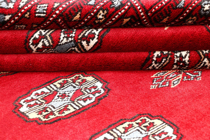 Red Pakistani Bokhara Rug 4' x 6'2" Hand-Knotted | No. QA27568