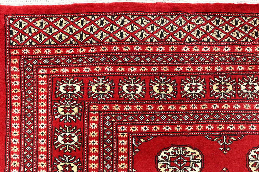 Red Pakistani Bokhara Rug 6' 2" x 9' Hand-Knotted | No. QA27858