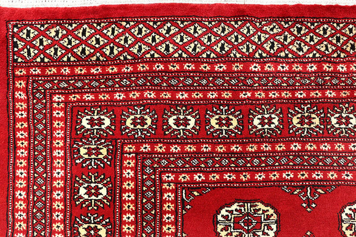Red Pakistani Bokhara Rug 6' 2" x 9' Hand-Knotted | No. QA27858