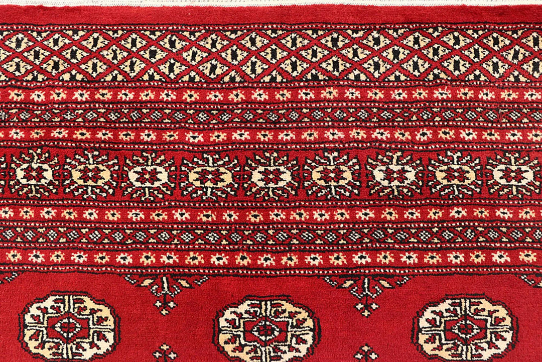 Red Pakistani Bokhara Rug 6' 2" x 9' Hand-Knotted | No. QA27858