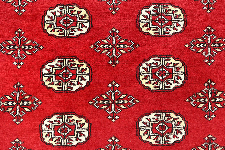 Red Pakistani Bokhara Rug 6' 2" x 9' Hand-Knotted | No. QA27858