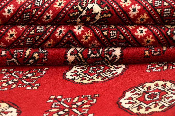 Red Pakistani Bokhara Rug 6' 2" x 9' Hand-Knotted | No. QA27858