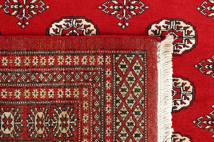 Red Pakistani Bokhara Rug 6' 2" x 9' Hand-Knotted | No. QA27858